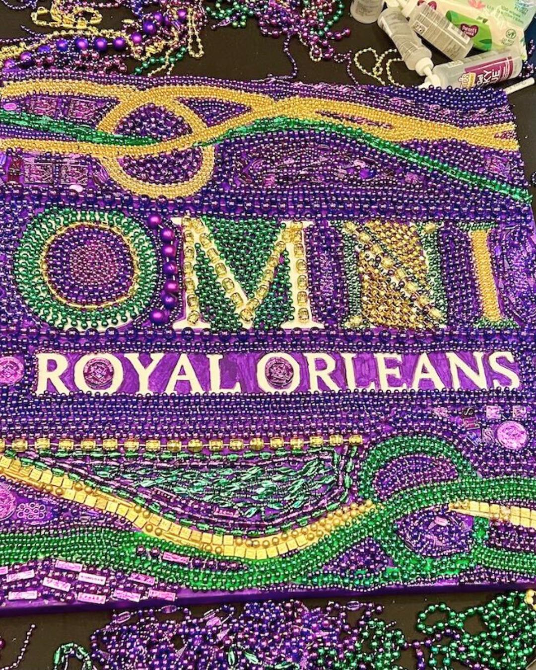Completed Omni Royal Orleans bead art panel crafted by corporate groups during an ACCENT New Orleans DMC team building event.